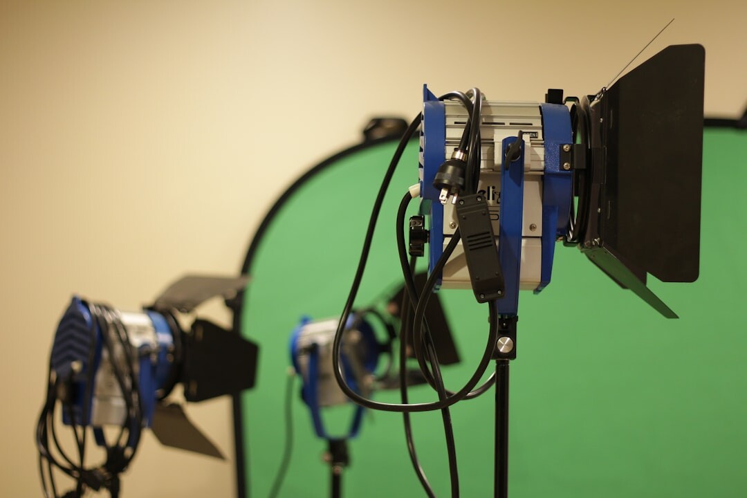 Modern professional video recording studio with cameras and studio lights