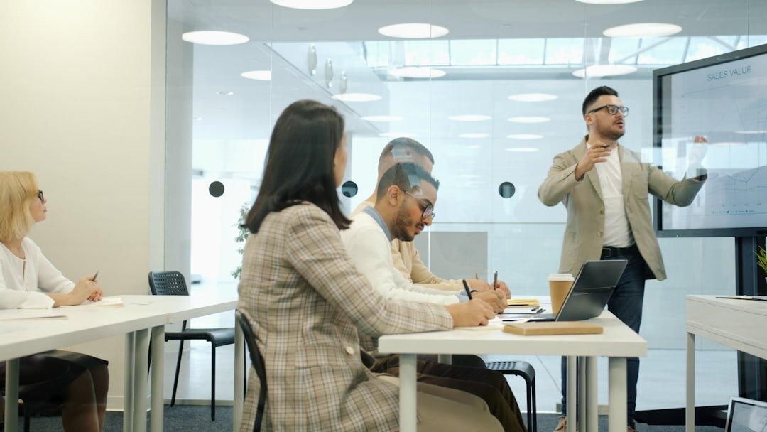 Presentation and media trainer coaching a business executive
